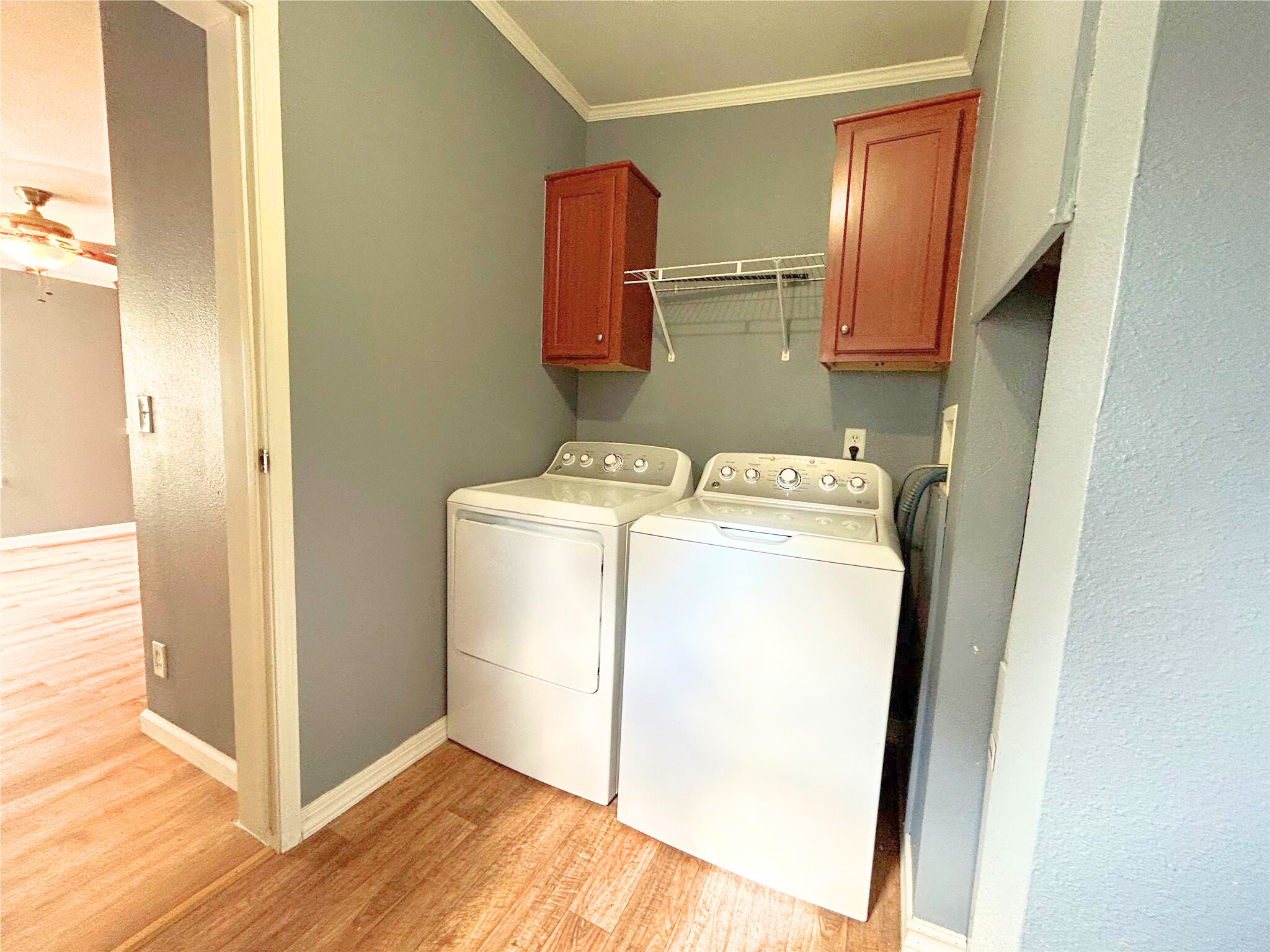 772 County Road 2191 Cleveland, TX 77327 - Photo 21 of 24 a utility room with dryer and washer