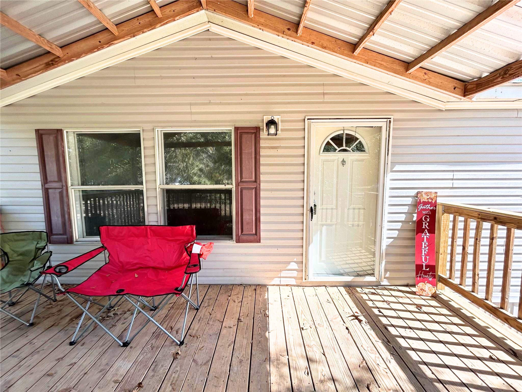 772 County Road 2191 Cleveland, TX 77327 - Photo 5 of 24 a view of a chairs on the deck