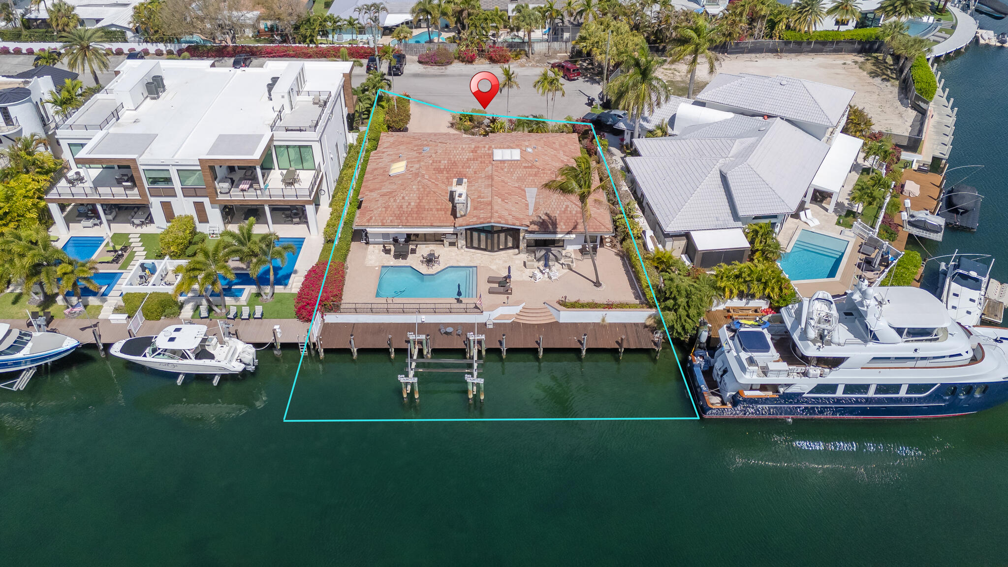 2810 Northeast 29th Street Lighthouse Point, FL 33064 - Photo 4 of 4 an aerial view of a house with a garden
