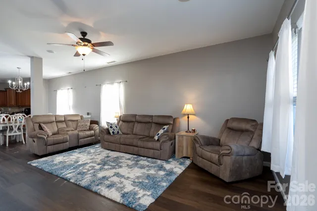 a living room with furniture and a couch