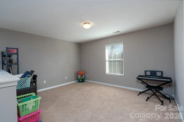 a room with furniture and a window