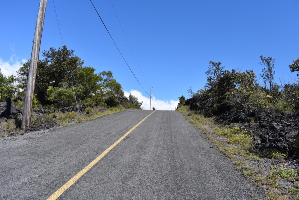 11 Lot Ocean View Ocean View, HI 96704 - Photo 11 of 12 a view of a road with a building in the background