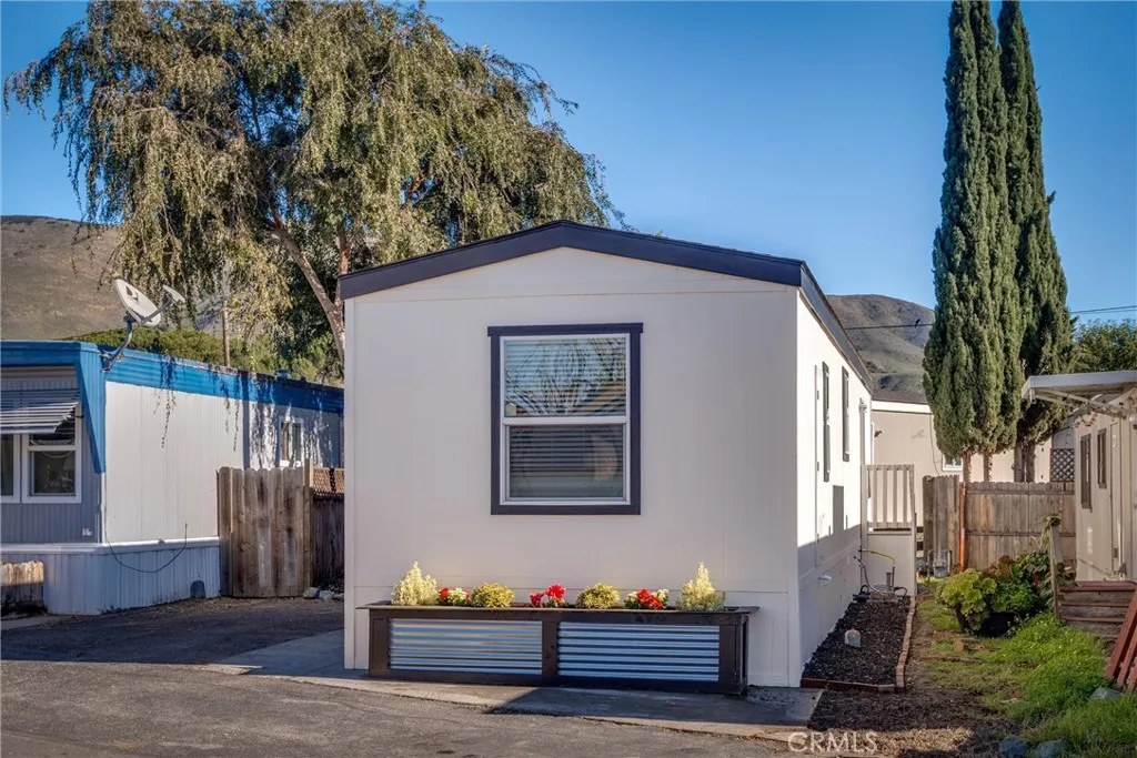 1255 Orcutt Road, Unit B14 San Luis Obispo, CA 93401 - Photo 2 of 11 a front view of a house with a yard
