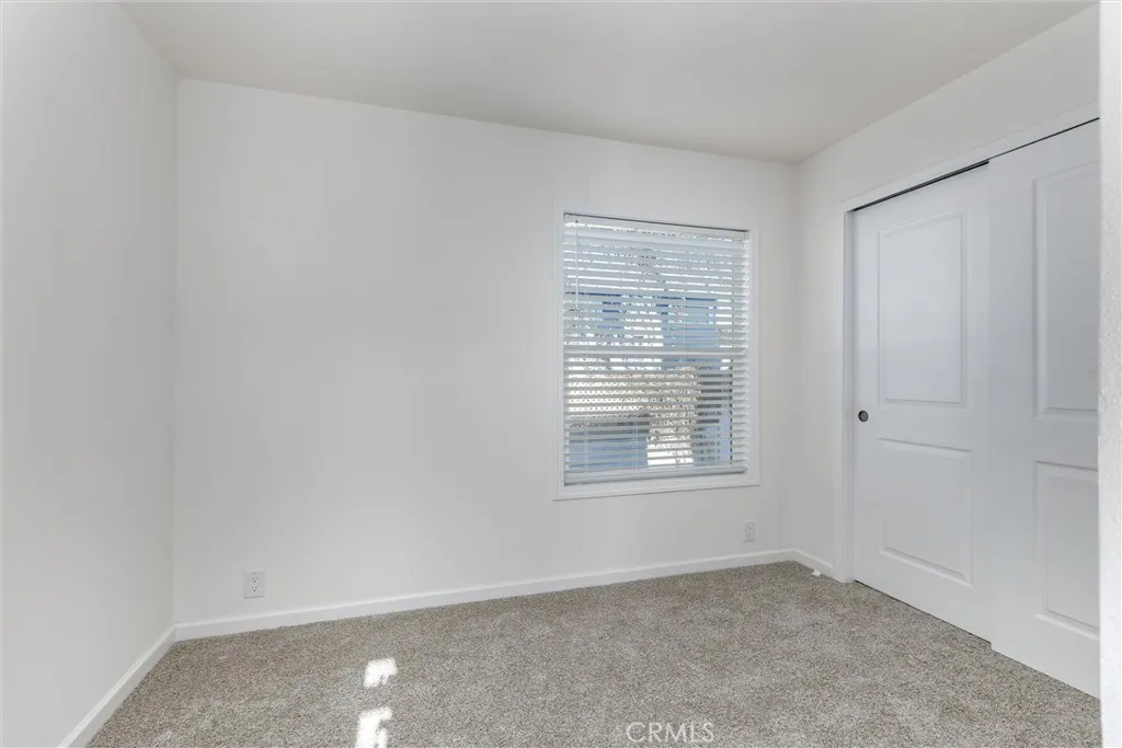 1255 Orcutt Road, Unit B14 San Luis Obispo, CA 93401 - Photo 9 of 11 an empty room with a window