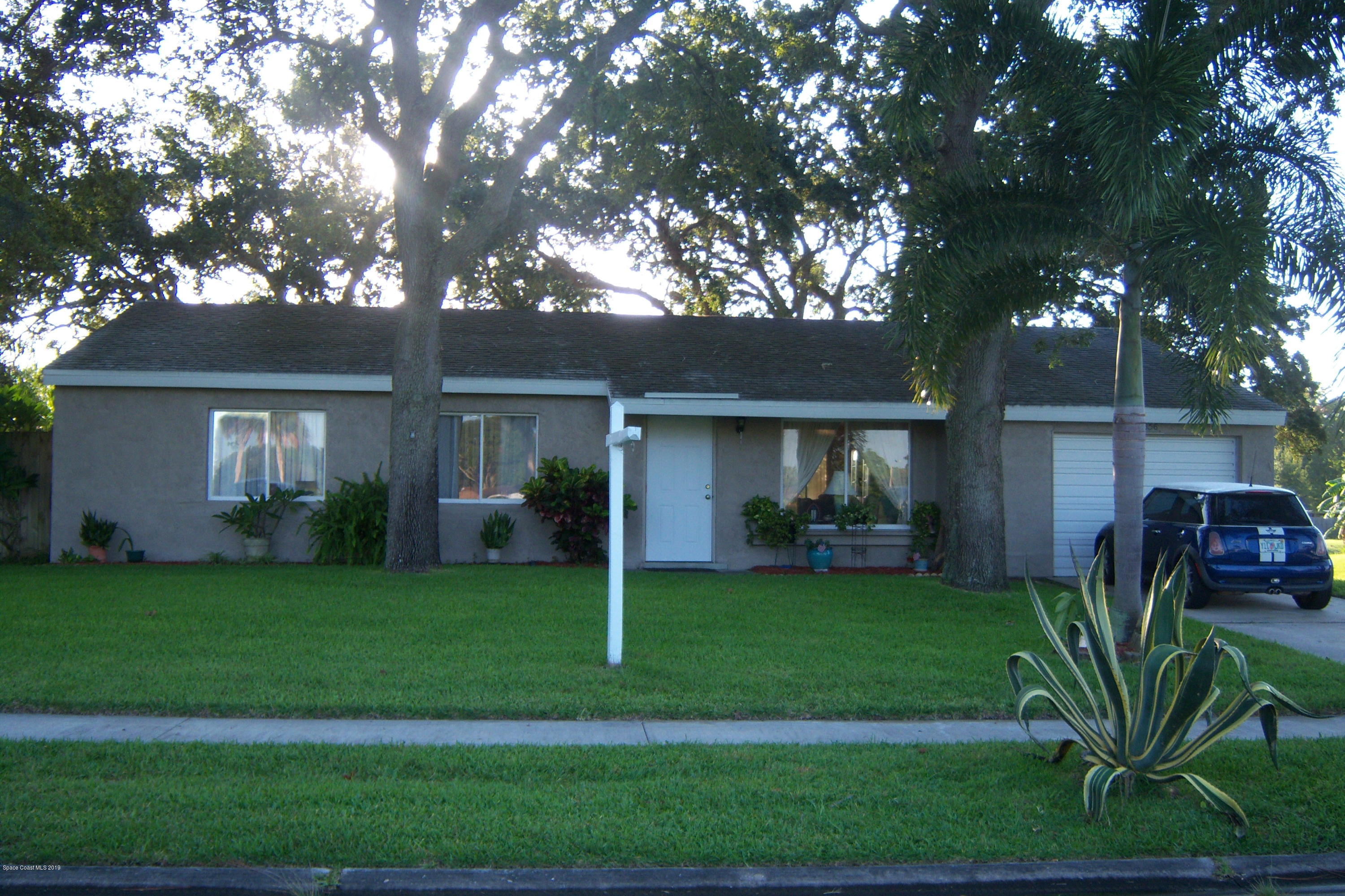 1556 Creel Road Northeast Palm Bay, FL 32905 - Photo 1 of 23 Front of Property