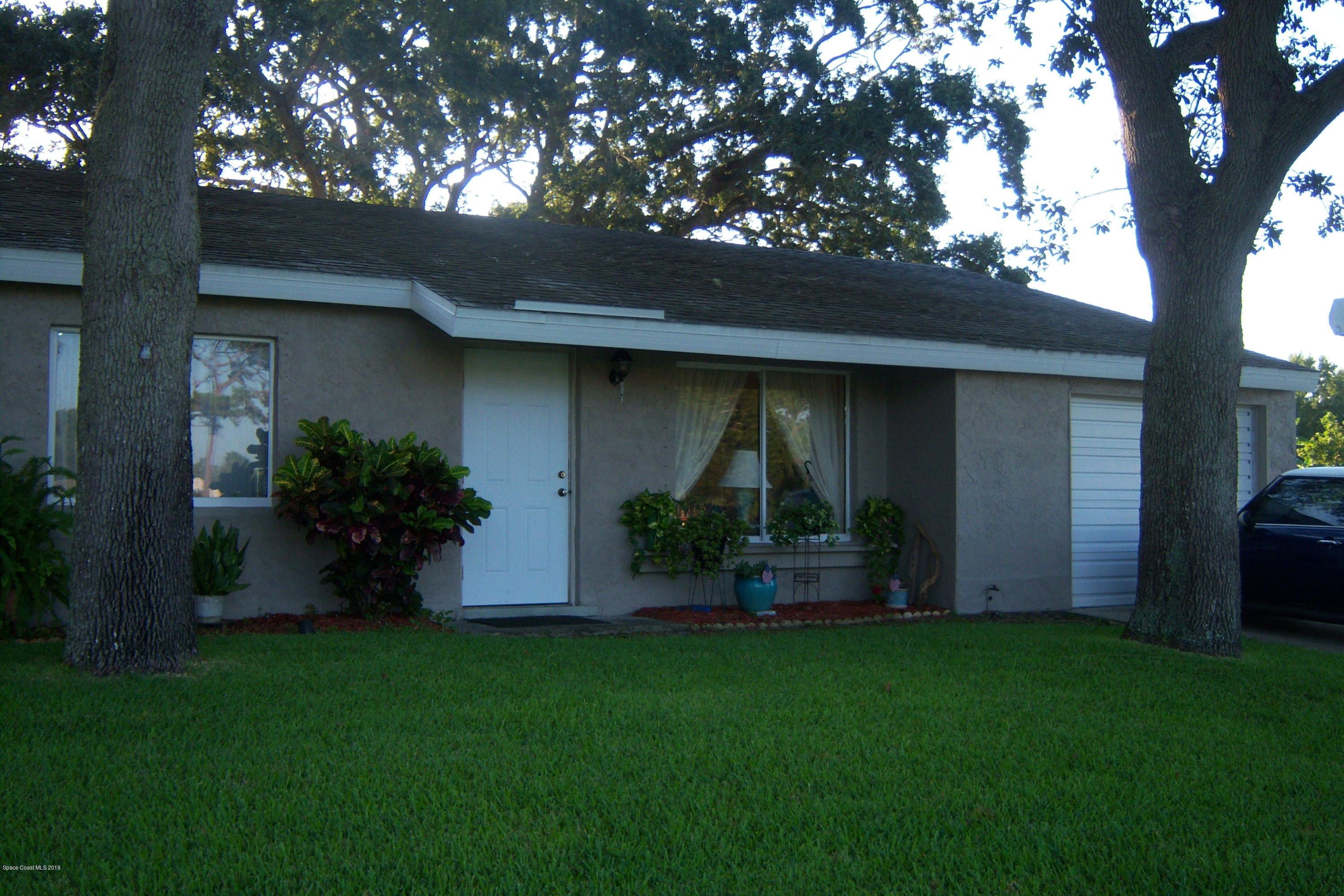 1556 Creel Road Northeast Palm Bay, FL 32905 - Photo 2 of 23 Close up front view