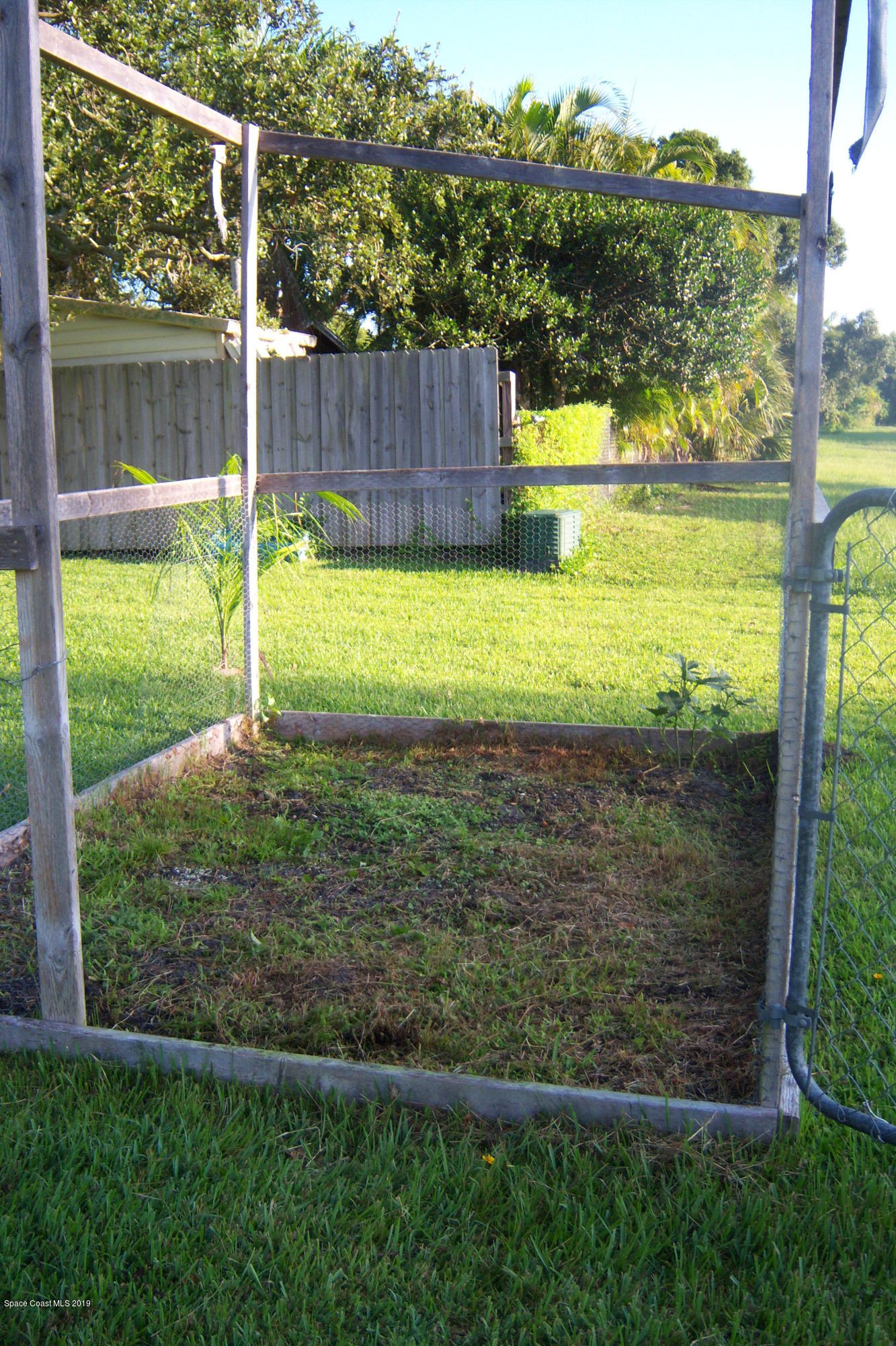 1556 Creel Road Northeast Palm Bay, FL 32905 - Photo 7 of 23 Garden area