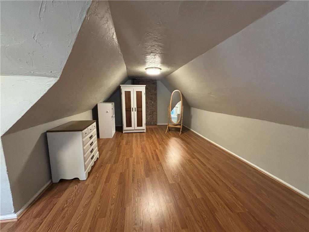 100 Spruce Street Rillton, PA 15678 - Photo 38 of 43 a view of empty room with wooden floor