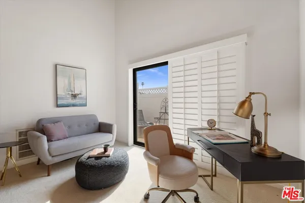 a view of a livingroom with furniture