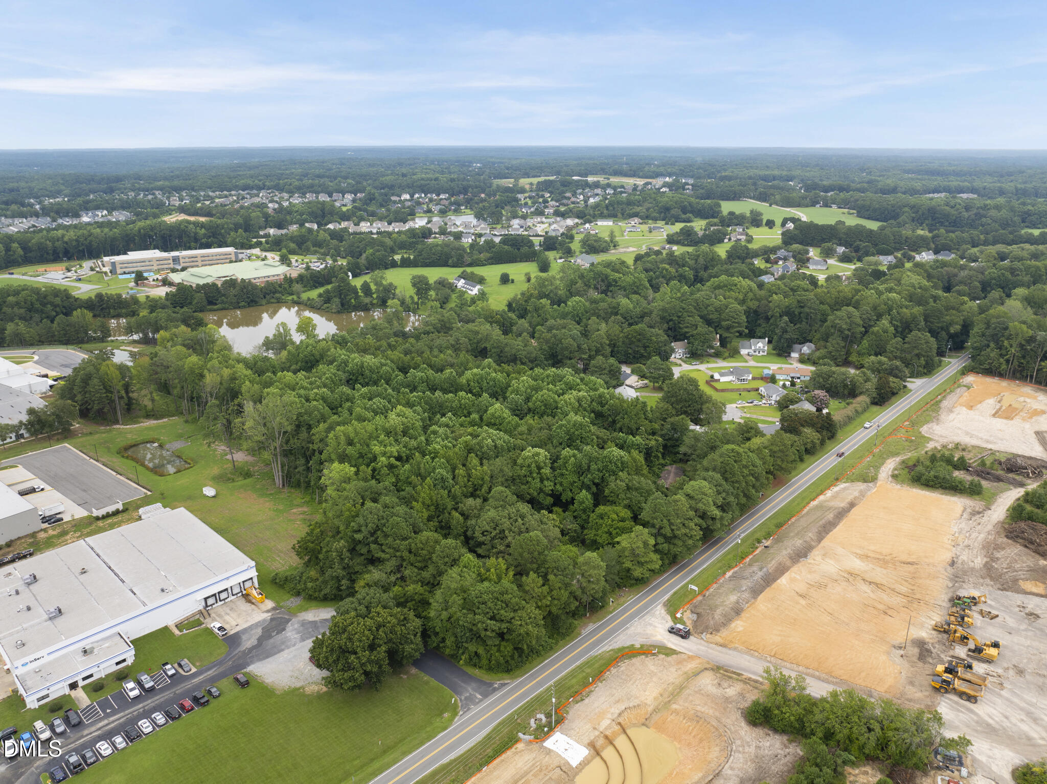 219 Dickens Road Fuquay-Varina, NC 27526 - Photo 4 of 13 DJI_20250814135708_0015_D
