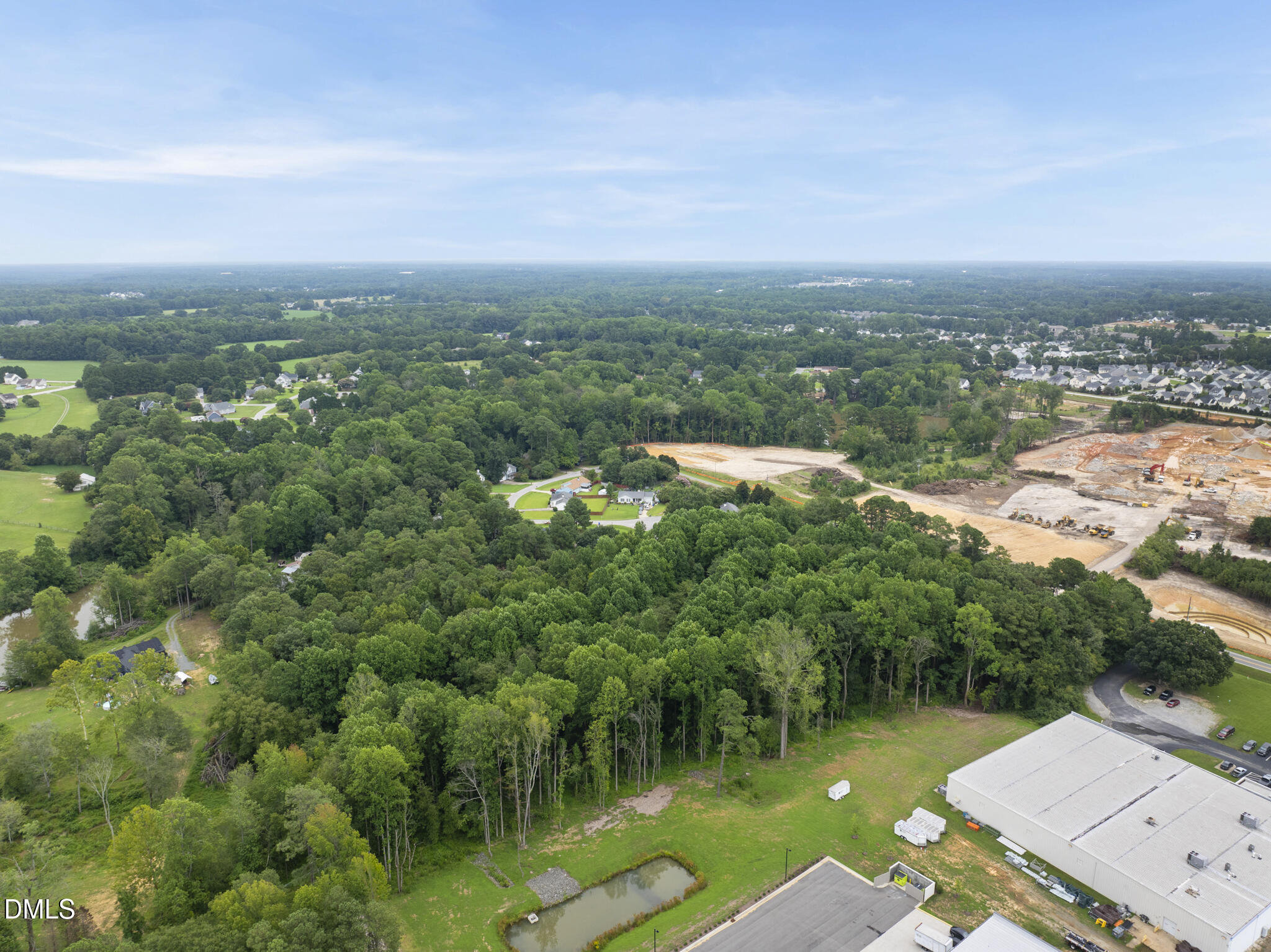 219 Dickens Road Fuquay-Varina, NC 27526 - Photo 5 of 13 DJI_20250814135753_0019_D