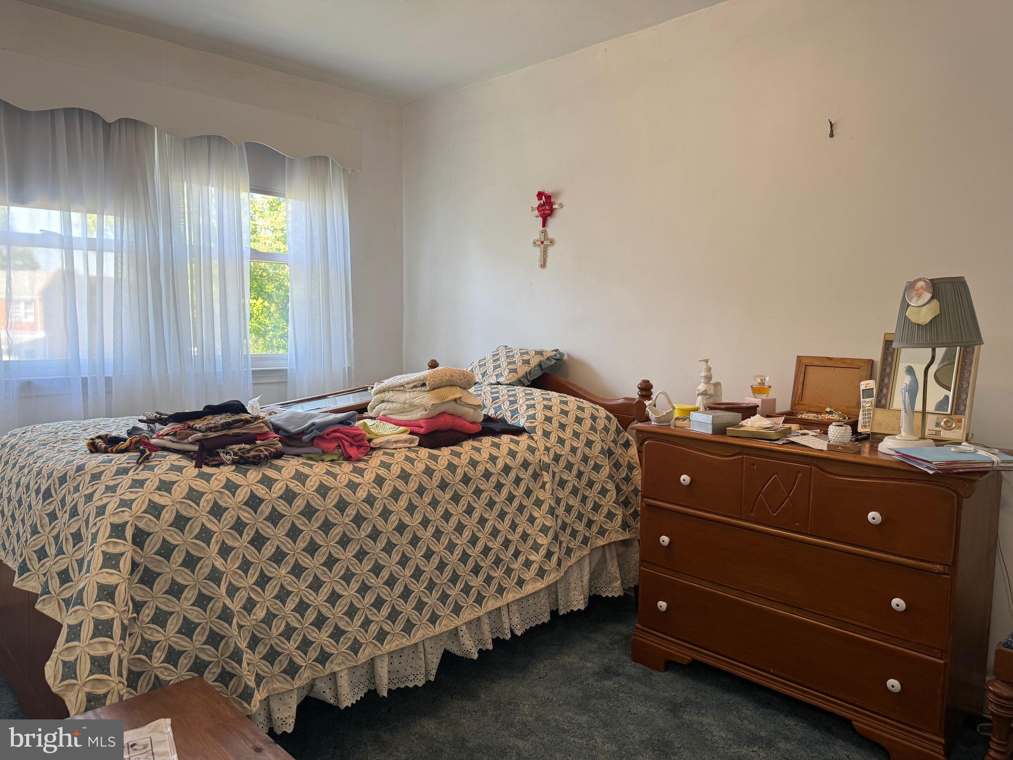 349 Grove Park Road Baltimore, MD 21225 - Photo 12 of 22 a bedroom with a bed and a window