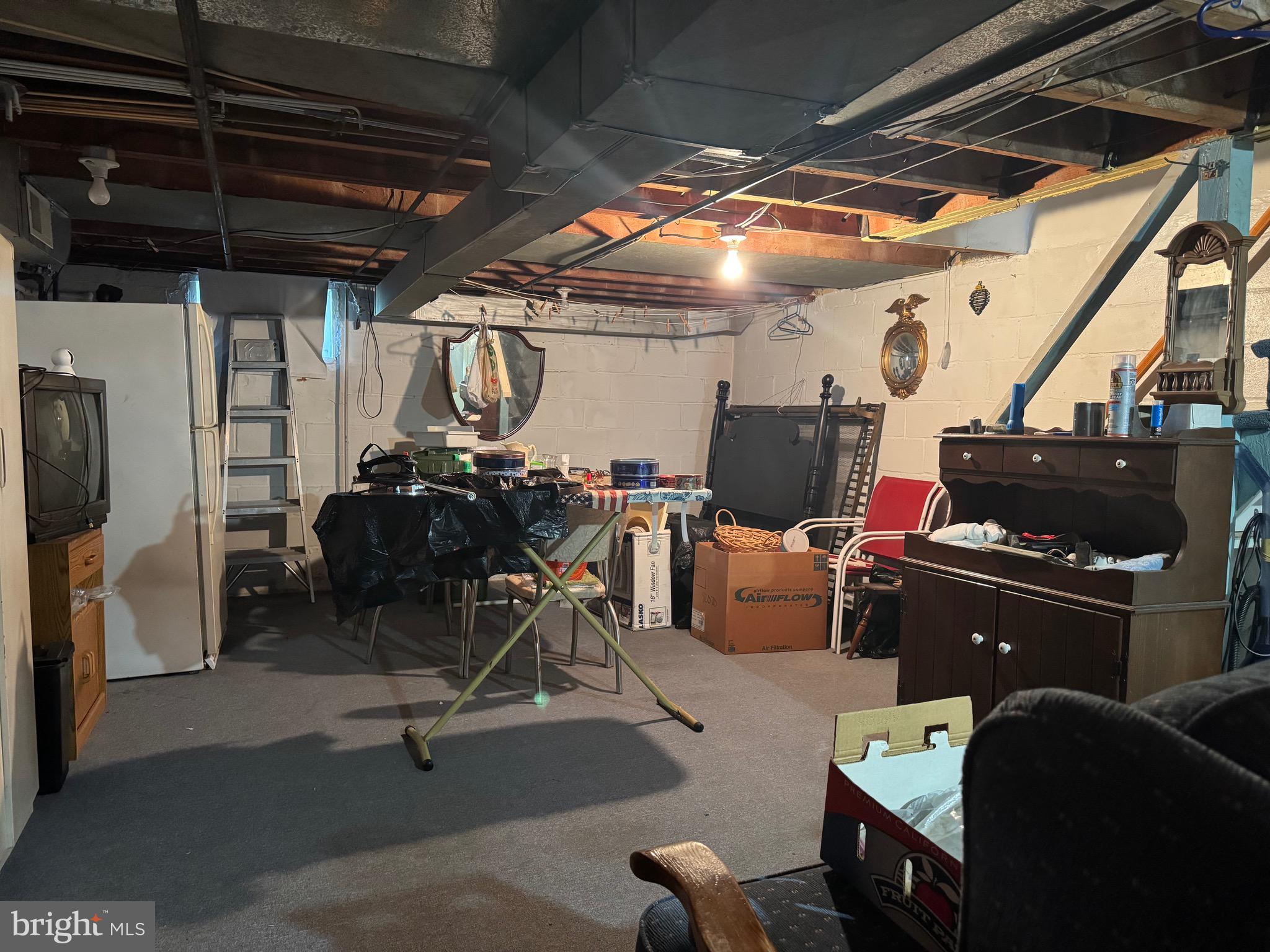 349 Grove Park Road Baltimore, MD 21225 - Photo 17 of 22 a room with furniture