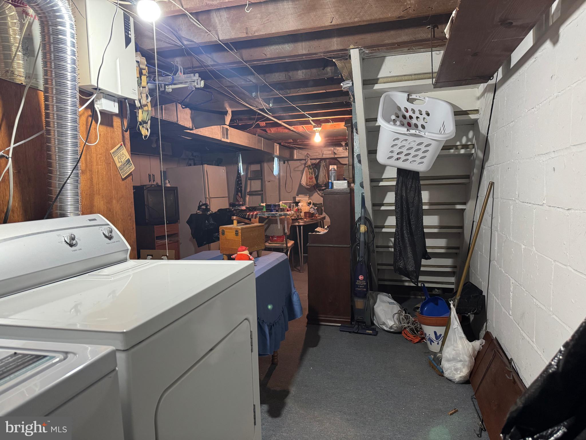 349 Grove Park Road Baltimore, MD 21225 - Photo 19 of 22 a utility room with dryer and washer