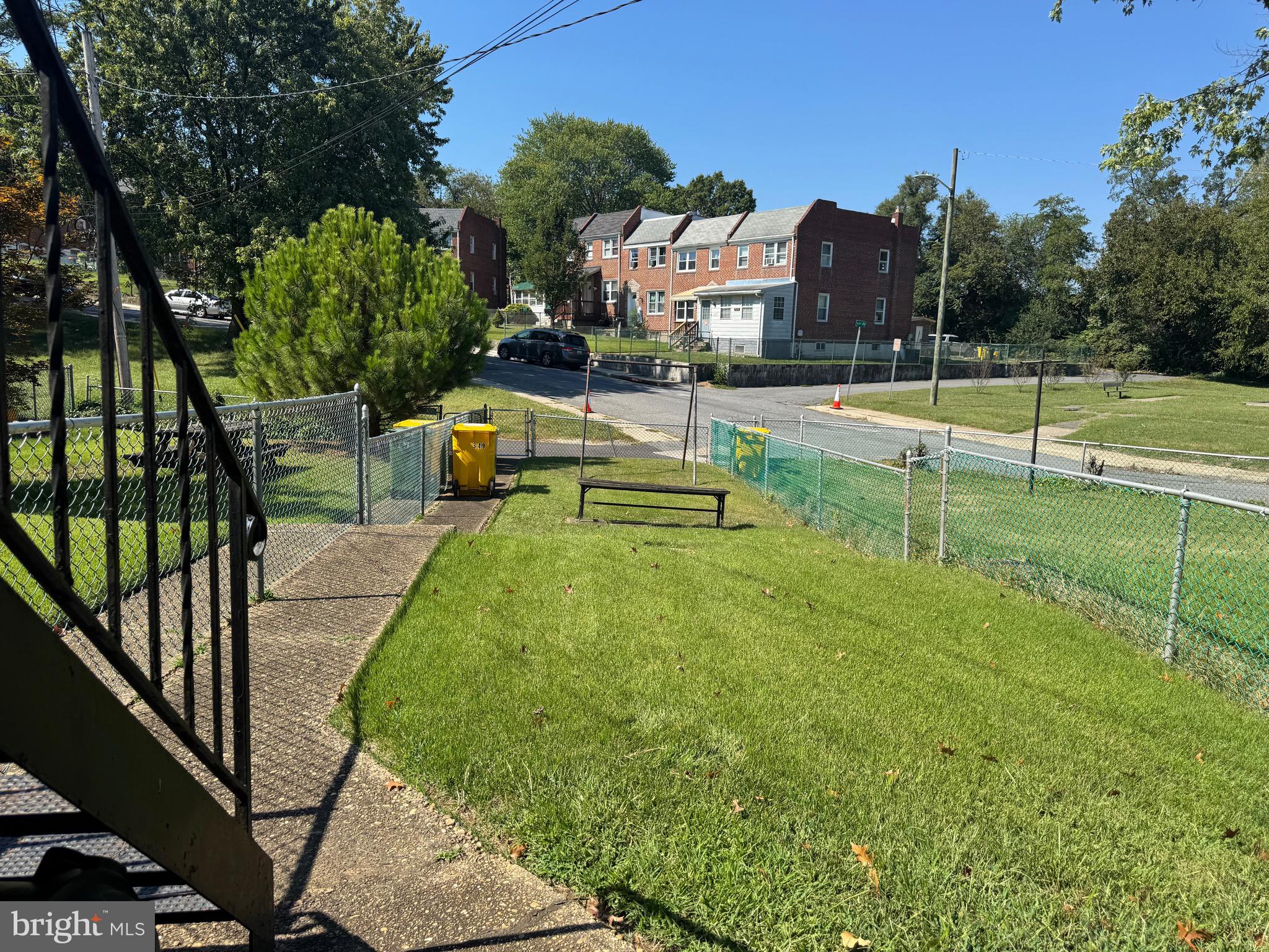 349 Grove Park Road Baltimore, MD 21225 - Photo 20 of 22 a view of a swimming pool with a patio