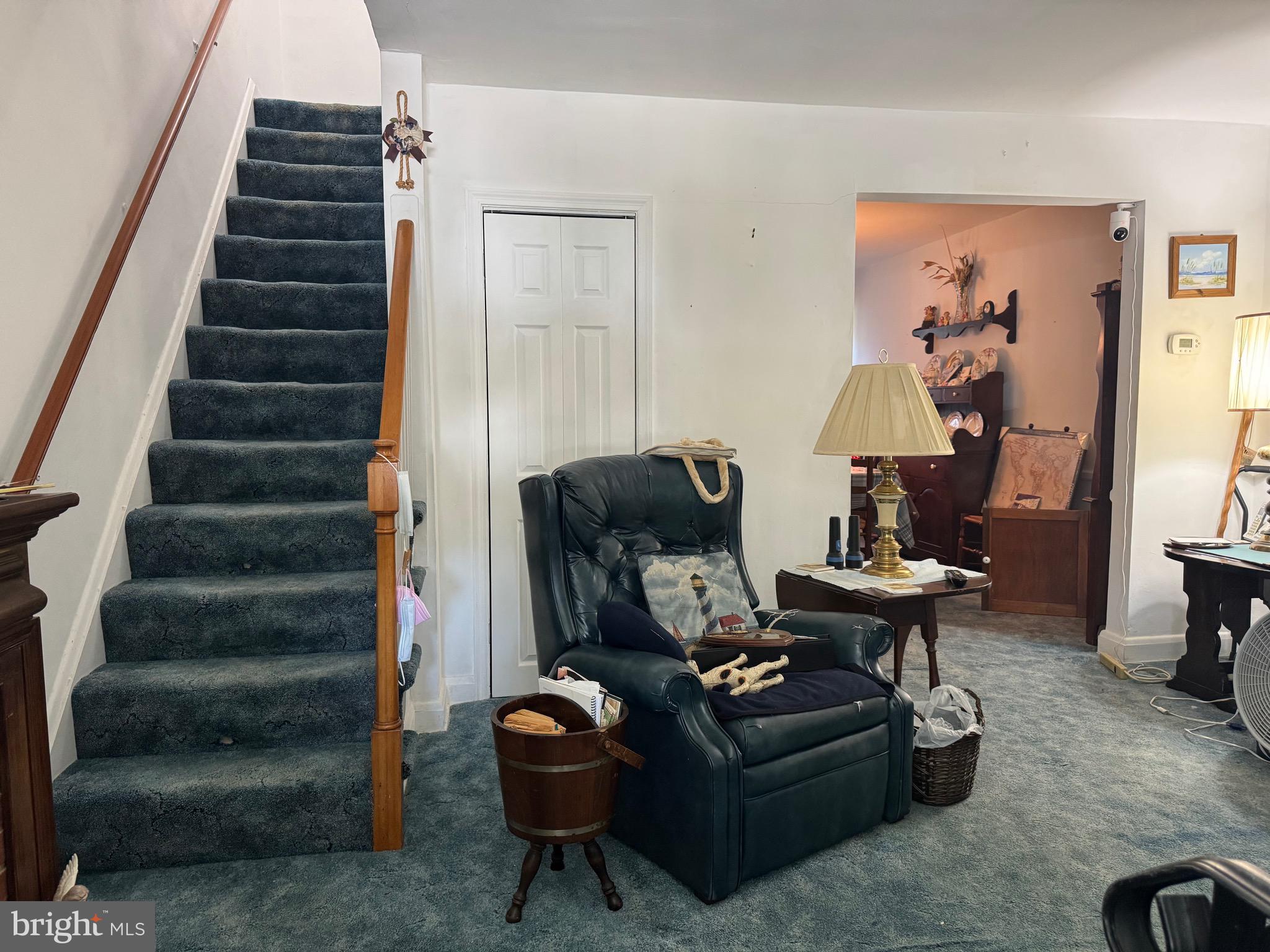 349 Grove Park Road Baltimore, MD 21225 - Photo 2 of 22 a living room with furniture and a wooden floor