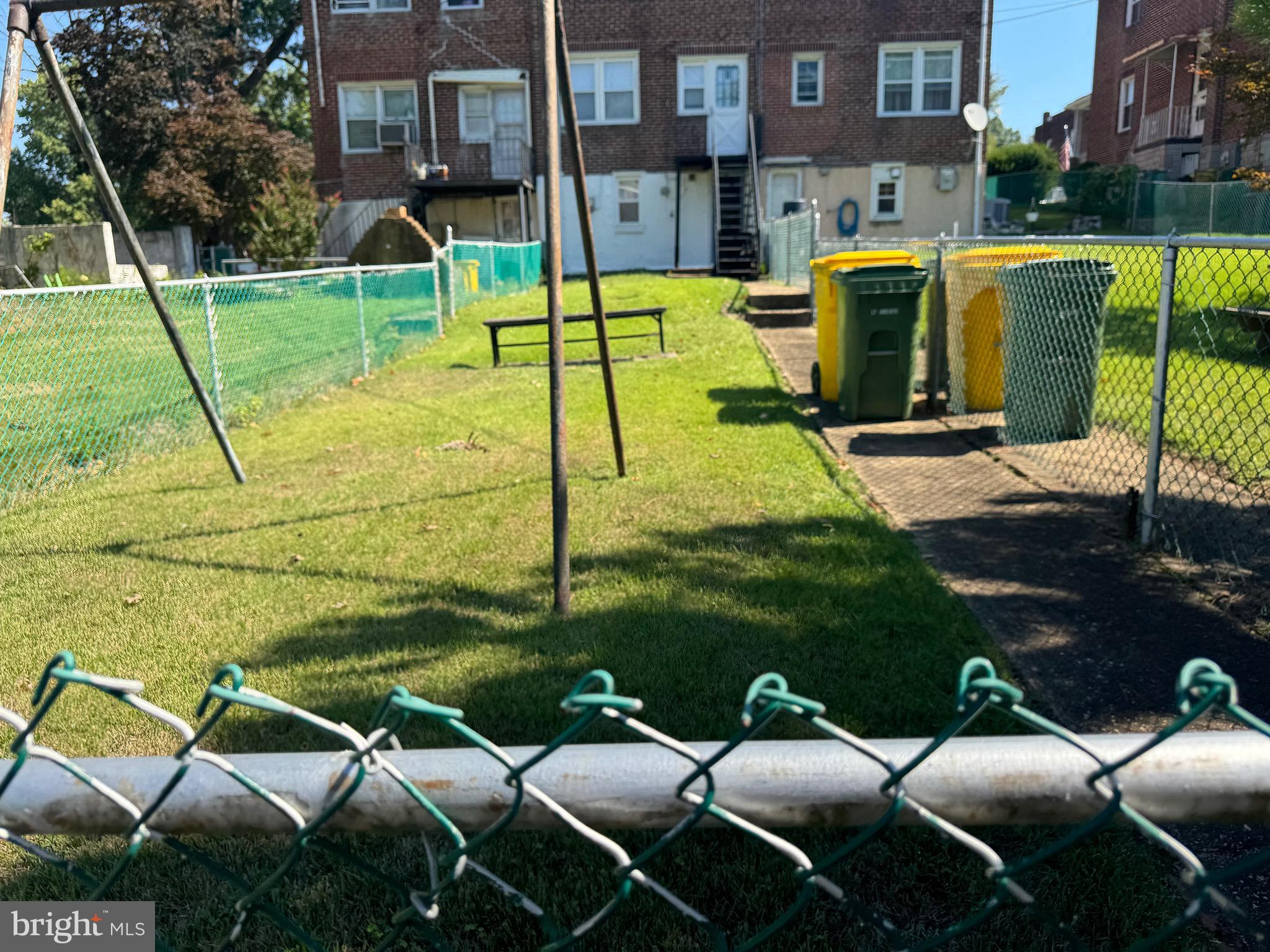 349 Grove Park Road Baltimore, MD 21225 - Photo 21 of 22 a view of a backyard with plants and patio