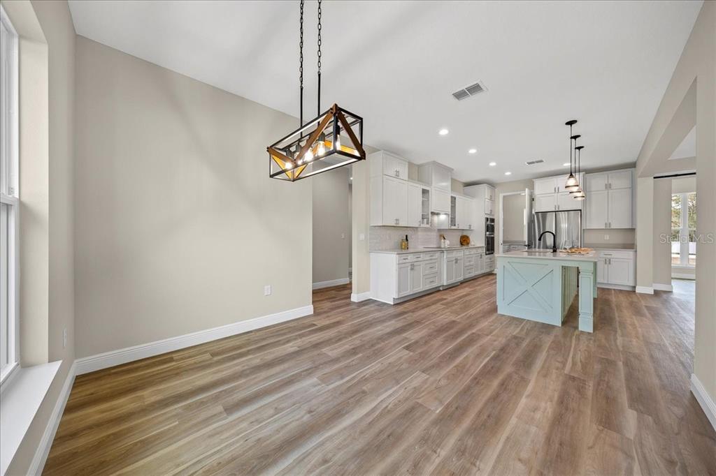 5315 Southwest 121st Terrace Ocala, FL 34481 - Photo 27 of 56 a view of kitchen with wooden floor