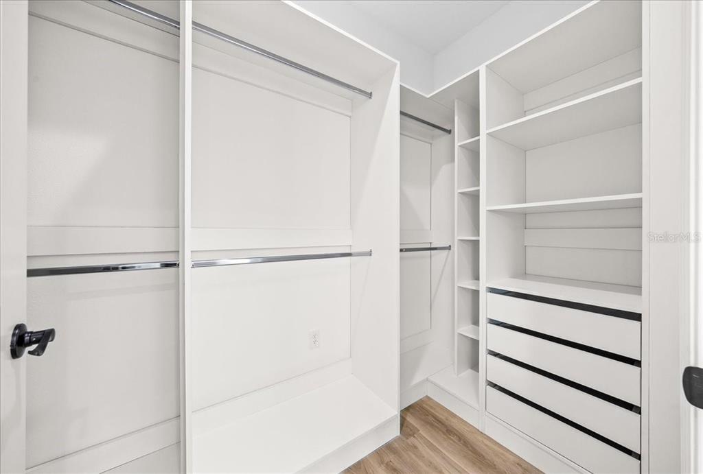 5315 Southwest 121st Terrace Ocala, FL 34481 - Photo 44 of 56 a view of walk in closet with empty racks