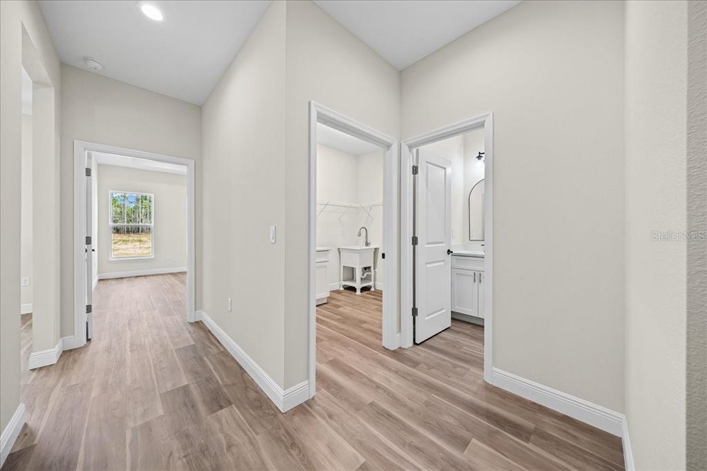 5315 Southwest 121st Terrace Ocala, FL 34481 - Photo 53 of 56 wooden floor with white walls