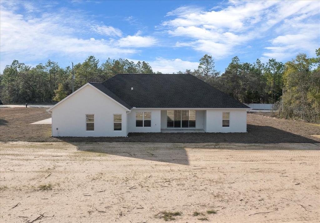 5315 Southwest 121st Terrace Ocala, FL 34481 - Photo 9 of 56 a view of a house with a yard