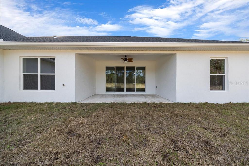 5315 Southwest 121st Terrace Ocala, FL 34481 - Photo 10 of 56 front view of a house with a large window