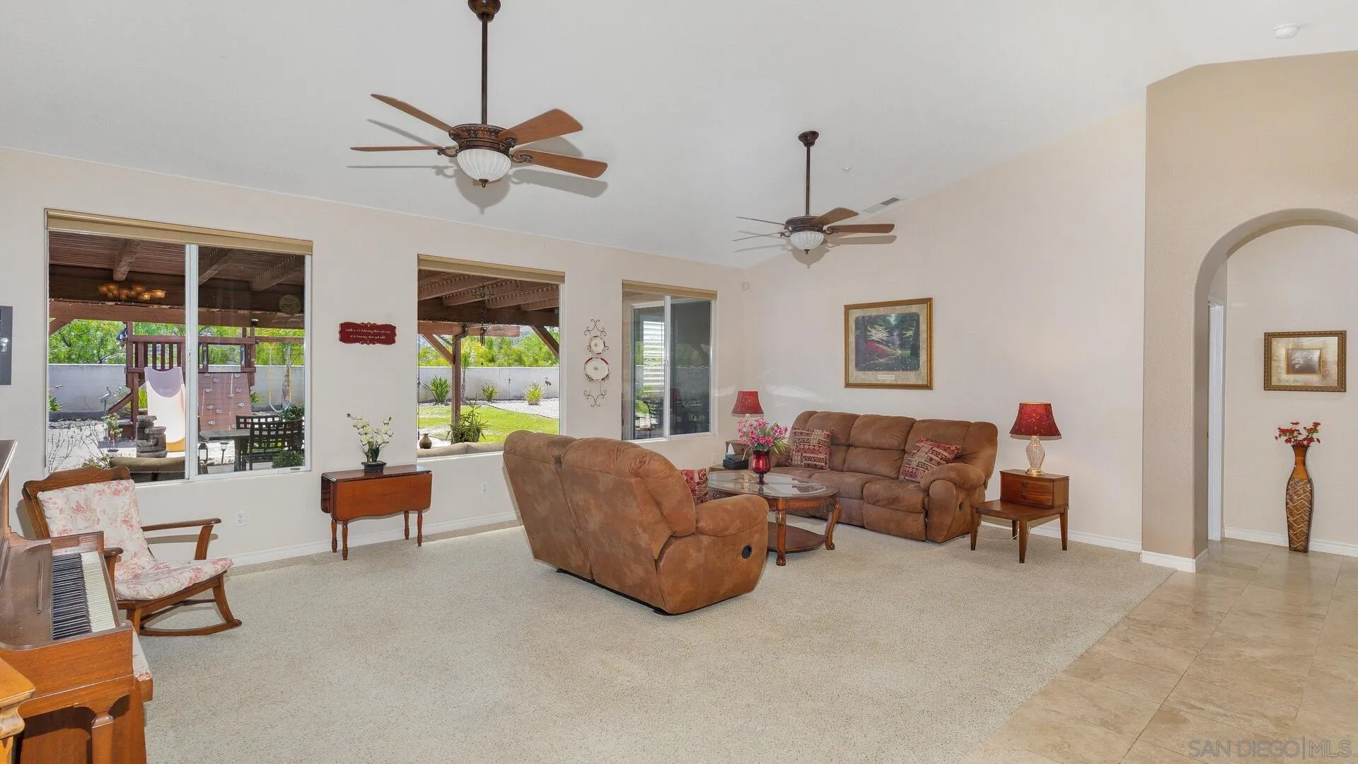 17435 Rising Dale Way Ramona, CA 92065 - Photo 9 of 24 a living room with furniture and a window