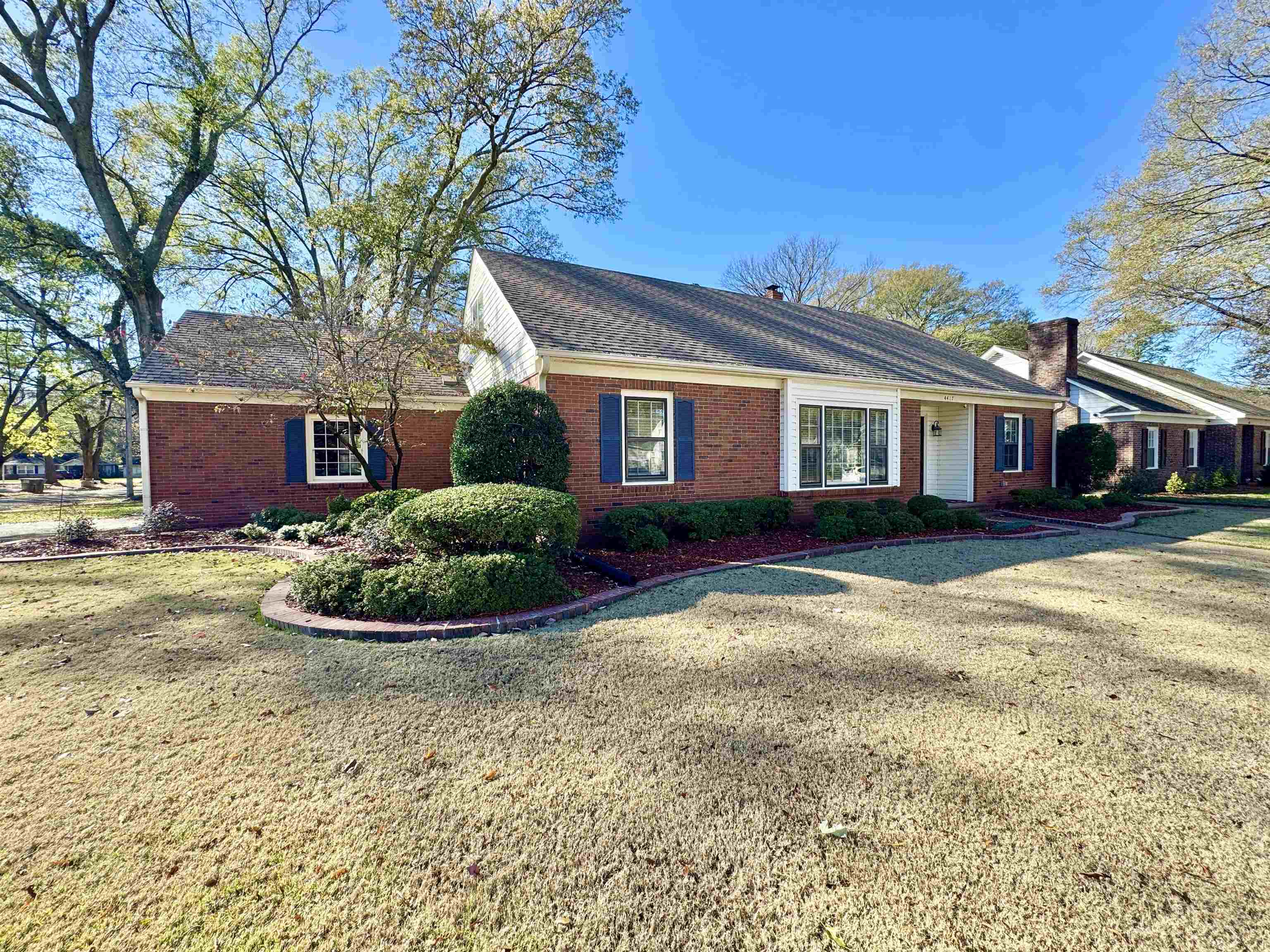 4417 Fair Meadow Road Memphis, TN 38117 - Photo 33 of 38 Ranch-style home with brick siding, a front lawn, a chimney, and roof with shingles