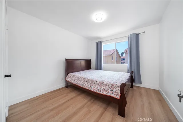 a bathroom with a double vanity sink toilet and shower