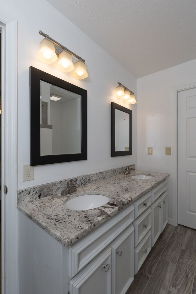 2495 Fortson Road Fortson, GA 31808 - Photo 13 of 30 a bathroom with a granite countertop sink and a mirror
