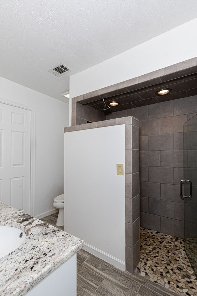2495 Fortson Road Fortson, GA 31808 - Photo 14 of 30 a bathroom with a granite countertop sink and a mirror