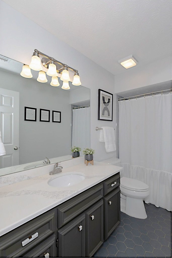 2495 Fortson Road Fortson, GA 31808 - Photo 15 of 30 a bathroom with a double vanity sink and a mirror