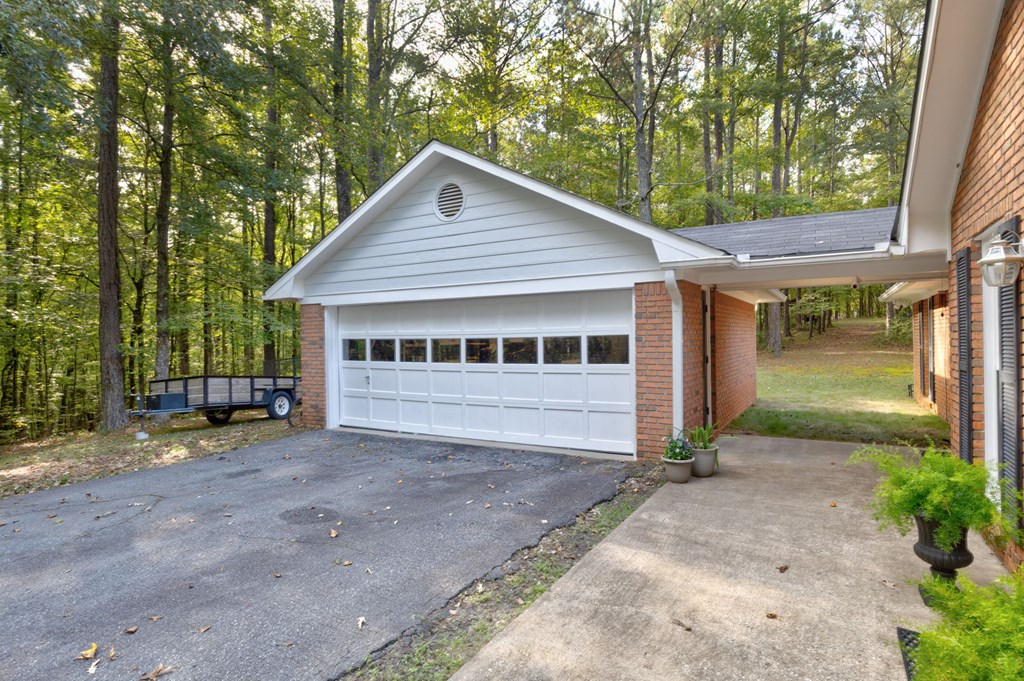 2495 Fortson Road Fortson, GA 31808 - Photo 25 of 30 a house with trees in the background