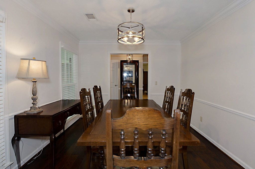2495 Fortson Road Fortson, GA 31808 - Photo 10 of 30 a view of a dining room with furniture and wooden floor
