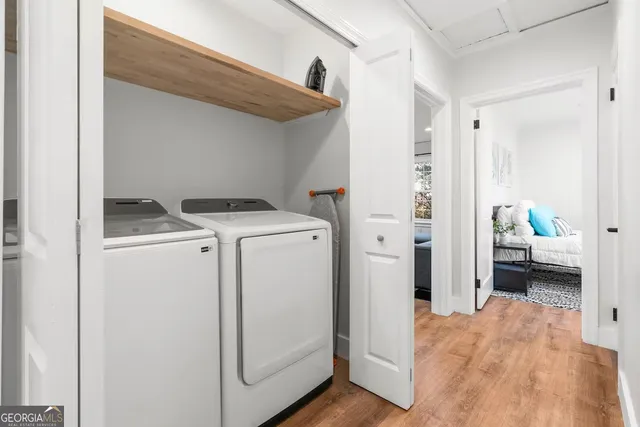 a utility room with dryer and washer