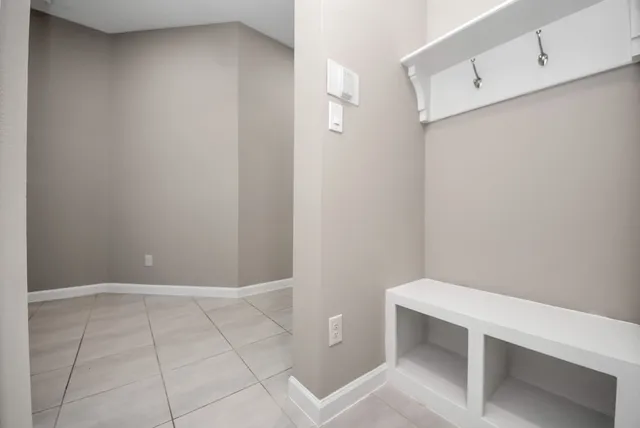 an aerial view of residential building and parking space