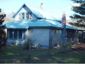 123 McMahan Gibbs Road Roan Mountain, TN 37687 - Photo 10 of 10 Rear and side view of home
