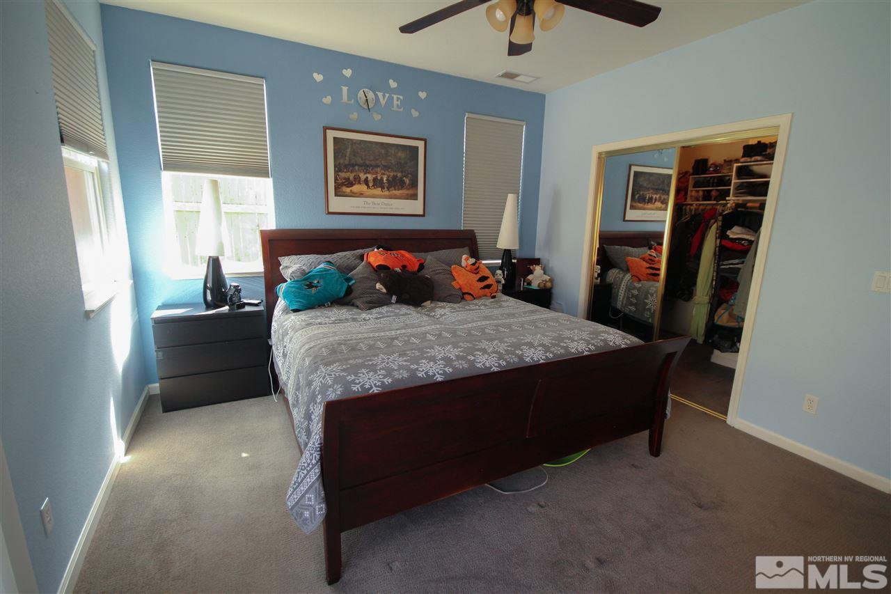 1707 River Gorge Court Reno, NV 89521 - Photo 11 of 18 a bedroom with a bed and dresser