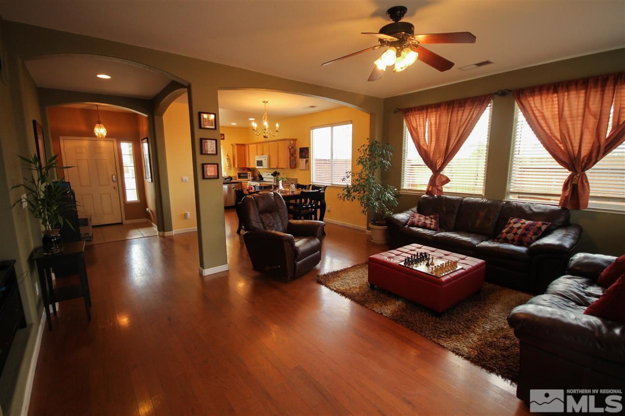 1707 River Gorge Court Reno, NV 89521 - Photo 3 of 18 a living room with furniture and a large window