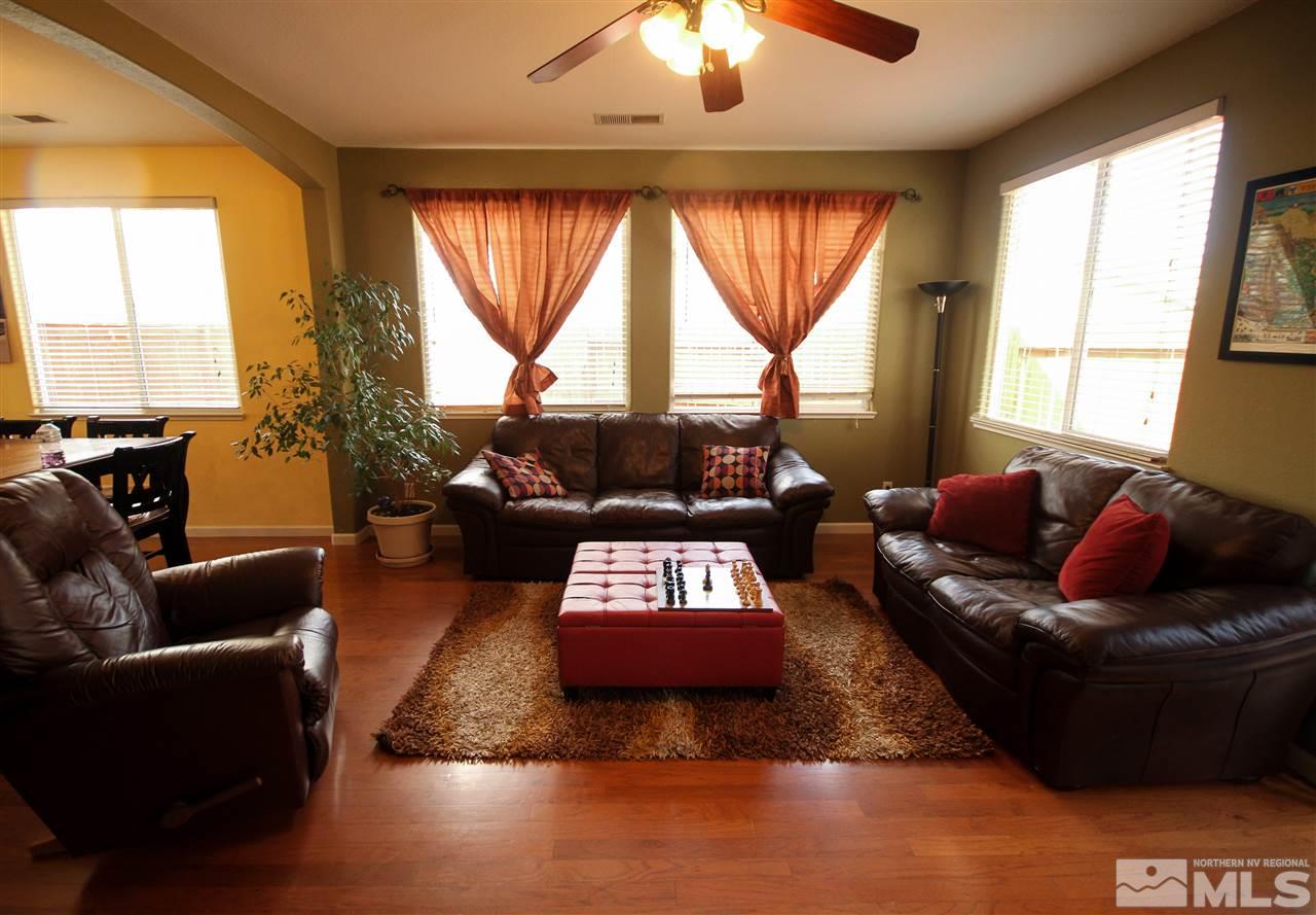 1707 River Gorge Court Reno, NV 89521 - Photo 5 of 18 a living room with furniture and a large window