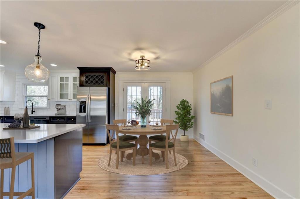 3463 Northlake Way Atlanta, GA 30340 - Photo 22 of 73 a view of a dining room with furniture window and wooden floor