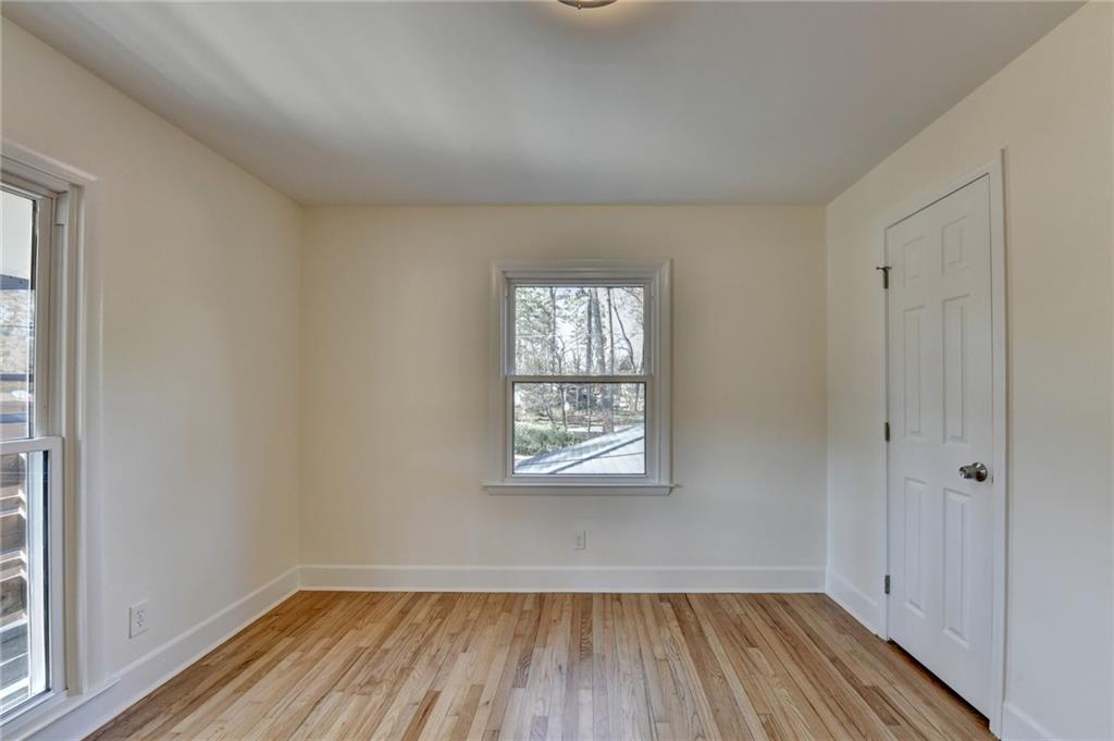 3463 Northlake Way Atlanta, GA 30340 - Photo 39 of 73 a view of wooden floor and windows in a room