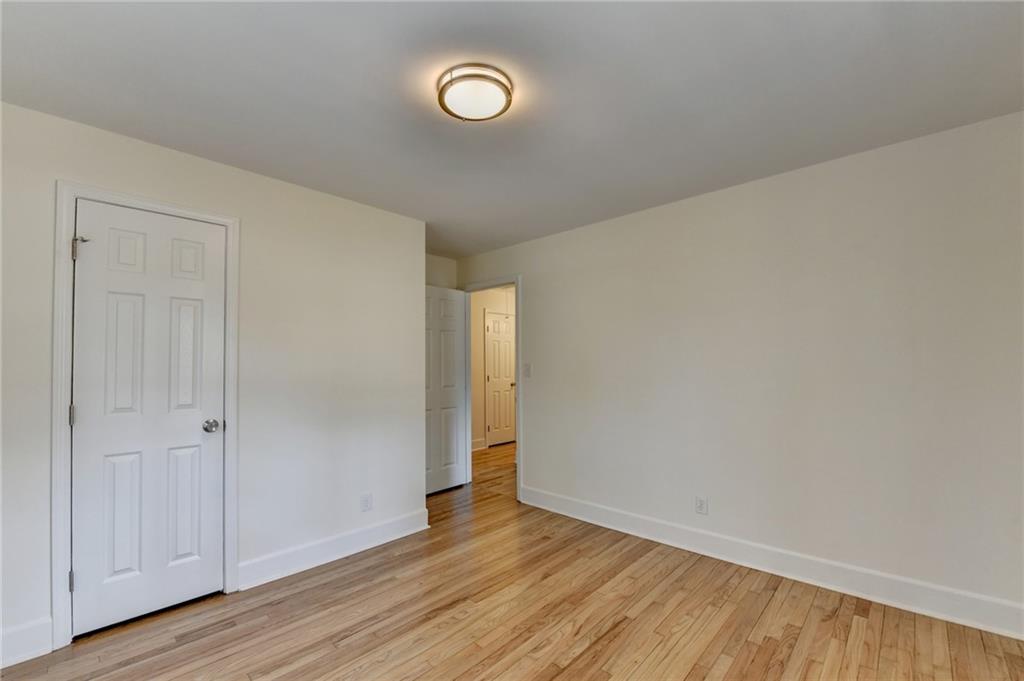 3463 Northlake Way Atlanta, GA 30340 - Photo 40 of 73 a view of an empty room with wooden floor