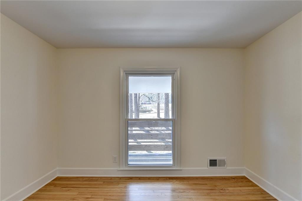 3463 Northlake Way Atlanta, GA 30340 - Photo 43 of 73 a view of a small space with wooden floor and a window
