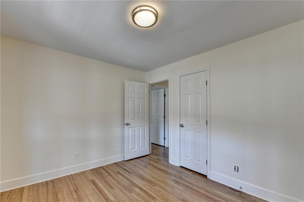 3463 Northlake Way Atlanta, GA 30340 - Photo 44 of 73 a view of room with wooden floor