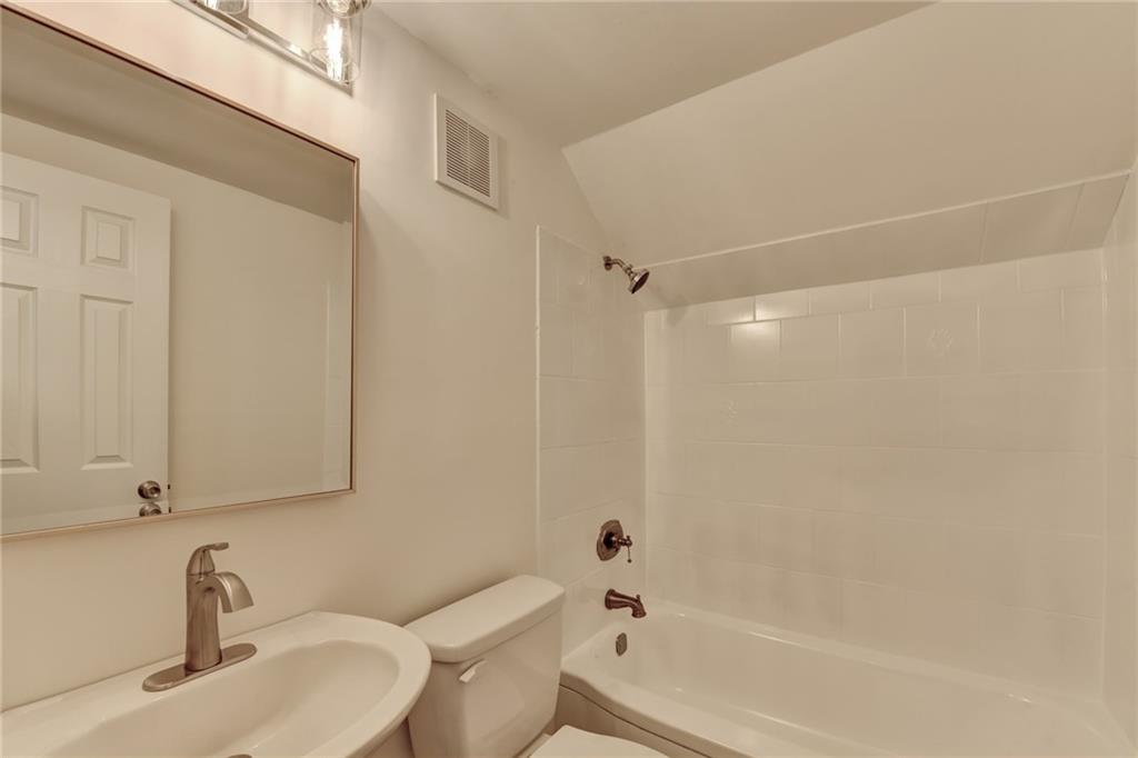 3463 Northlake Way Atlanta, GA 30340 - Photo 54 of 73 a bathroom with a sink and a shower