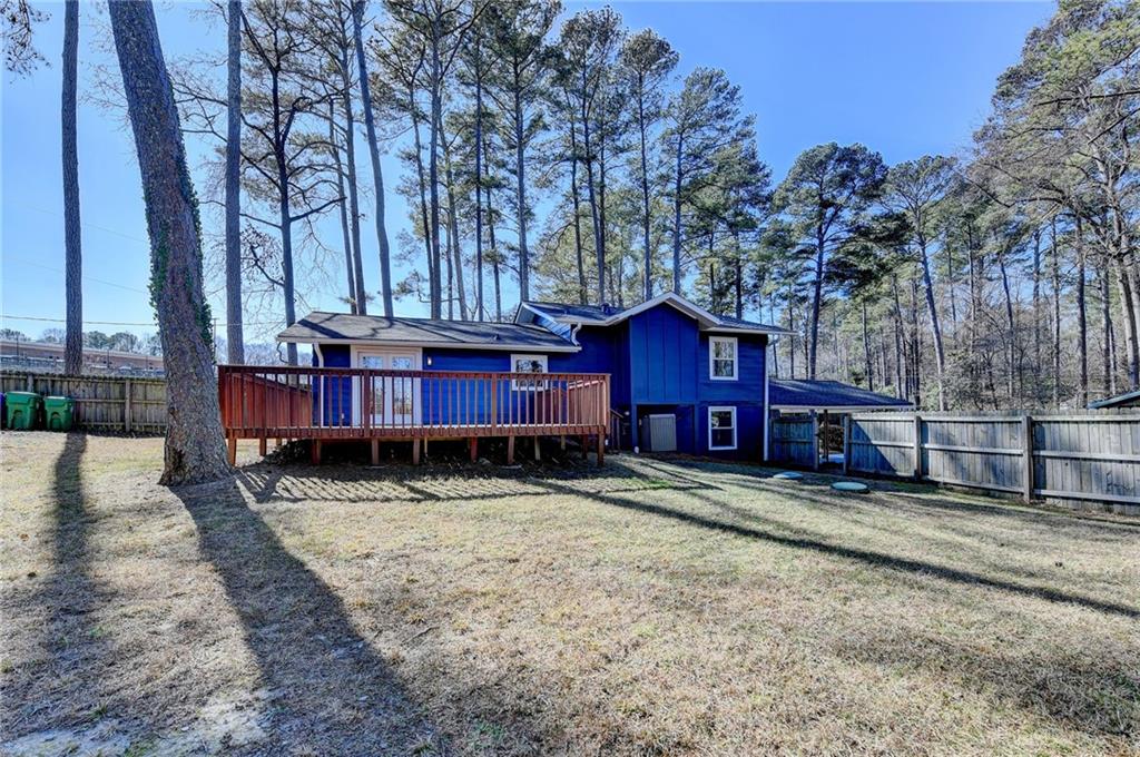 3463 Northlake Way Atlanta, GA 30340 - Photo 60 of 73 a view of a house with a yard covered in snow