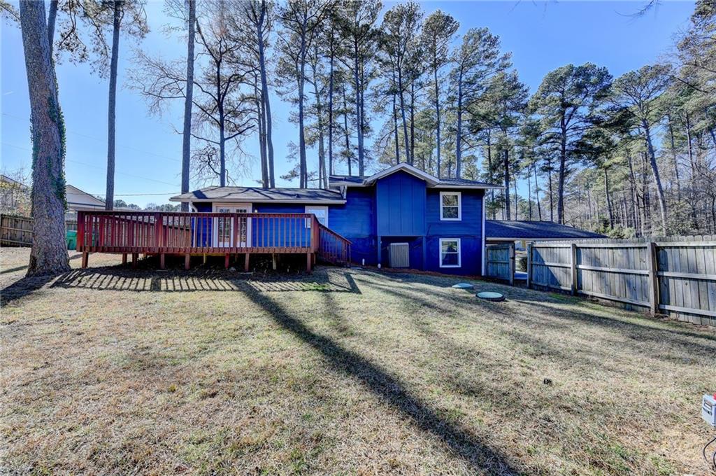 3463 Northlake Way Atlanta, GA 30340 - Photo 61 of 73 a view of a house with wooden fence next to a yard
