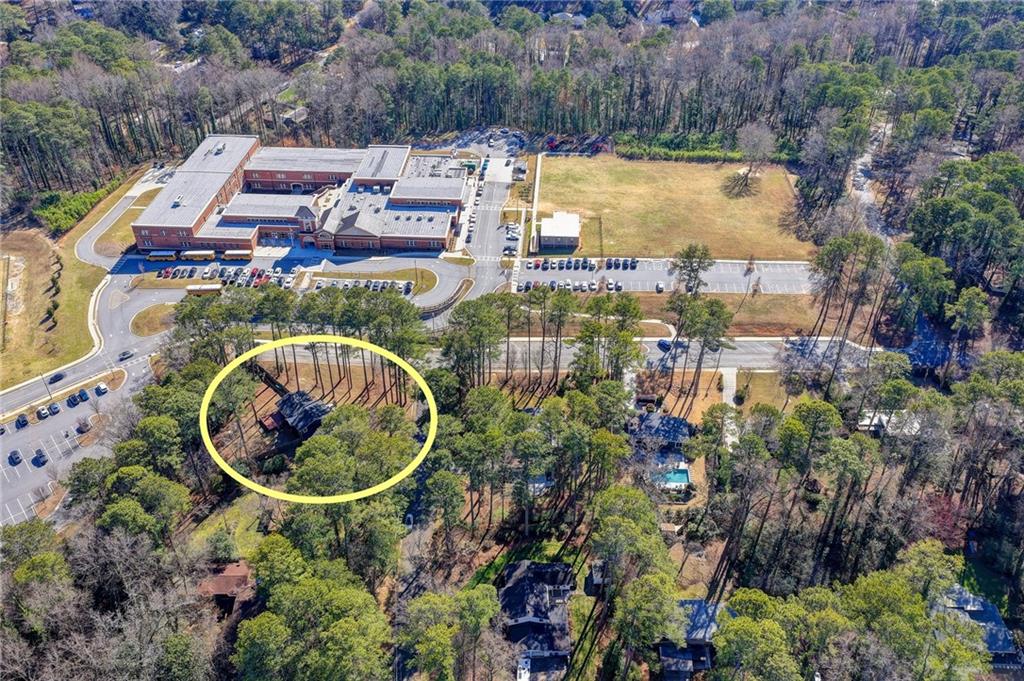 3463 Northlake Way Atlanta, GA 30340 - Photo 72 of 73 an aerial view of residential houses with outdoor space and swimming pool