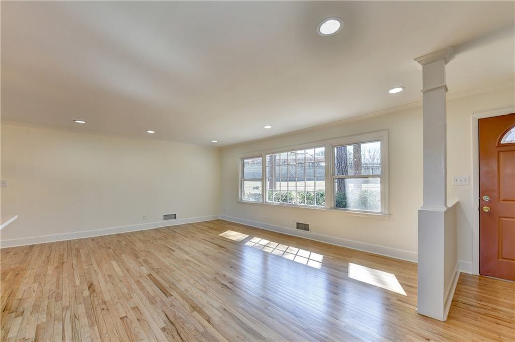 3463 Northlake Way Atlanta, GA 30340 - Photo 9 of 73 an empty room with wooden floor and windows